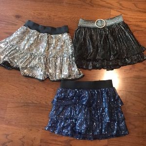 glittery skirts 3 brands of skirts fit size 10.